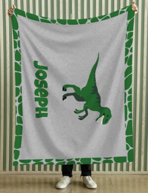 A DrakeKnit Knitted Raptor Blanket For Kids