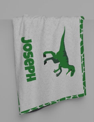 A DrakeKnit Knitted Raptor Blanket For Kids