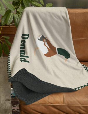A DrakeKnit Duck Blanket Over Couch