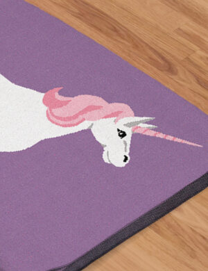A DrakeKnit Knitted Unicorn Blanket for Kids