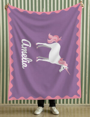 A DrakeKnit Knitted Unicorn Blanket for Kids