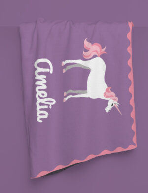 A DrakeKnit Knitted Unicorn Blanket for Kids